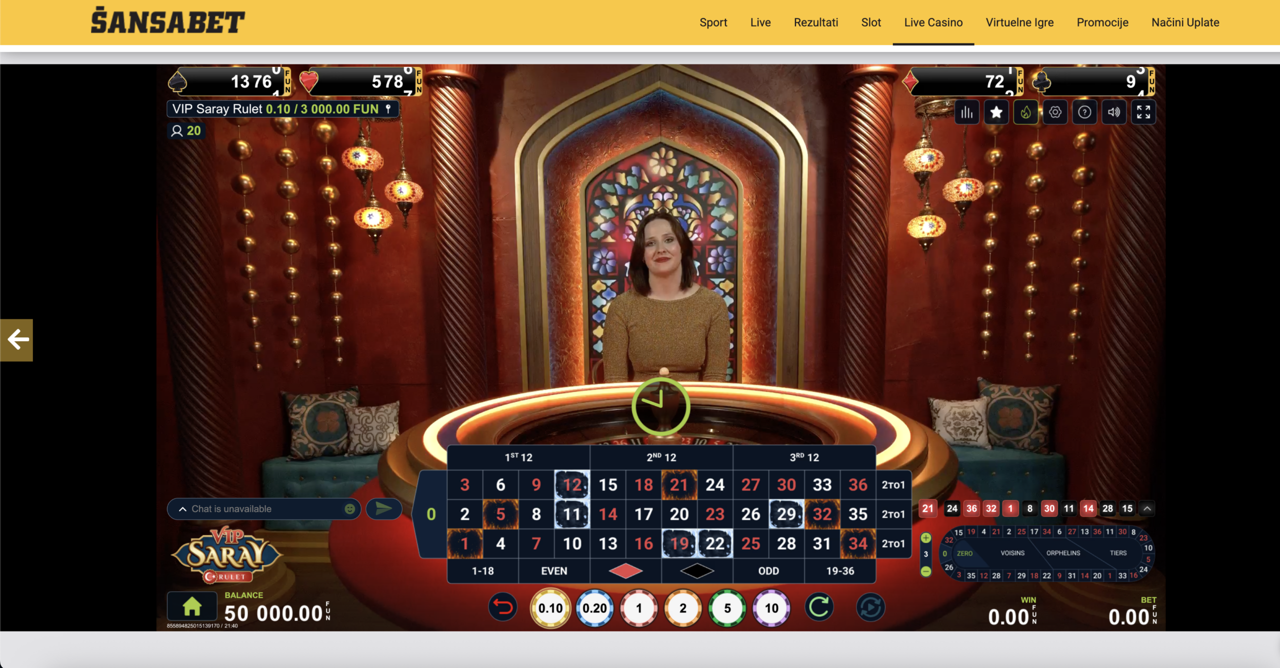 Live casino studio sa stolovima i pravim krupijeima